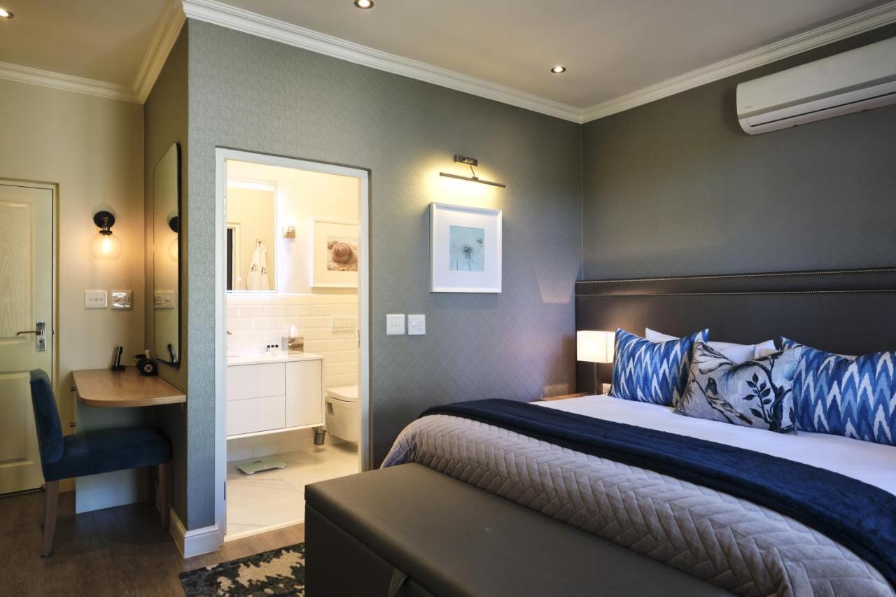 Alluvia Boutique Winery & Luxury Accommodation Stellenbosch Exteriör bild A bedroom at the Oyster Box