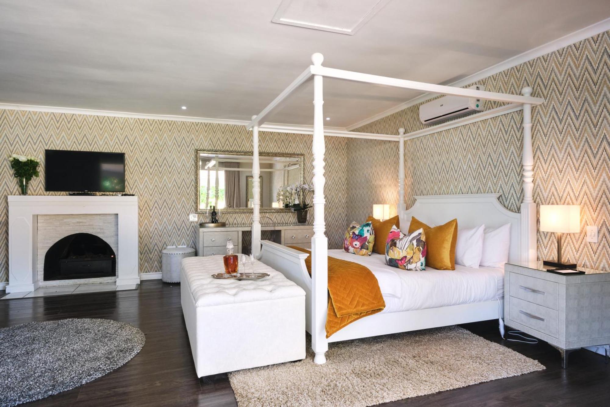 Alluvia Boutique Winery & Luxury Accommodation Stellenbosch Rum bild A bedroom at the Cape Heritage