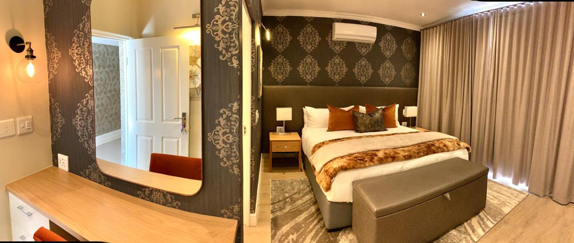 Alluvia Boutique Winery & Luxury Accommodation Stellenbosch Rum bild A bedroom at the Cape Heritage